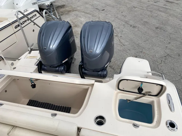  Yacht Photos Pics 2022 Grady-White Freedom 325 boat with dual Yamaha outboard engines, rear view.