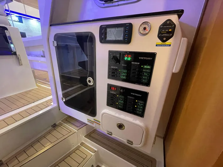  Yacht Photos Pics Control panel of 2024 Victory V400 Open Sea boat with digital displays and gauges.