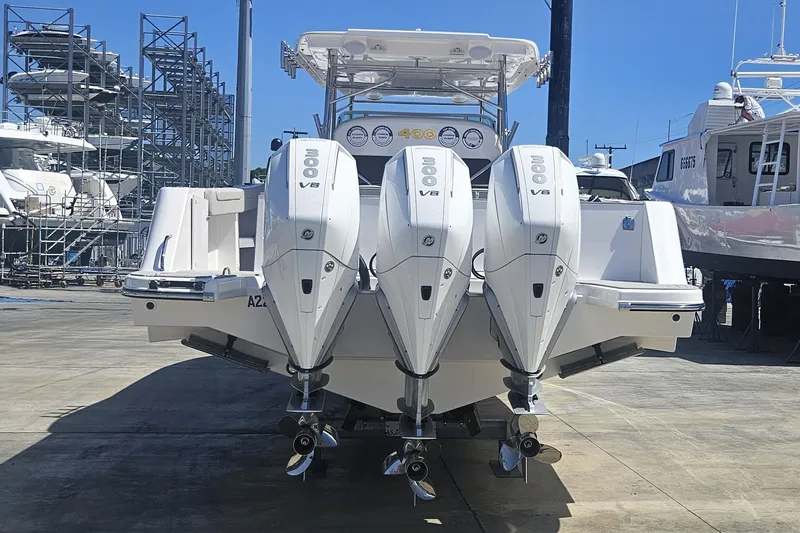  Yacht Photos Pics 2024 Victory Yachts V400 Open Sea with triple 300 V8 engines, docked at marina.