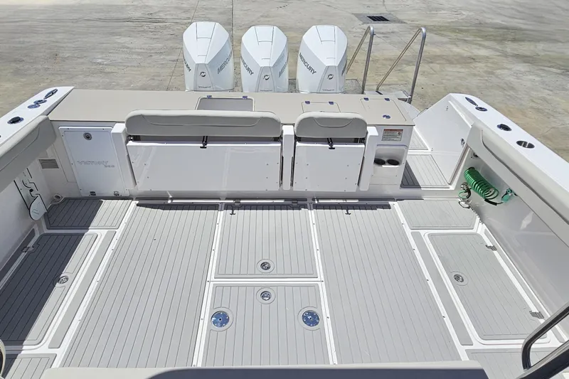  Yacht Photos Pics 2024 Victory Yachts V400 Open Sea deck with Mercury engines, spacious layout, and modern design.