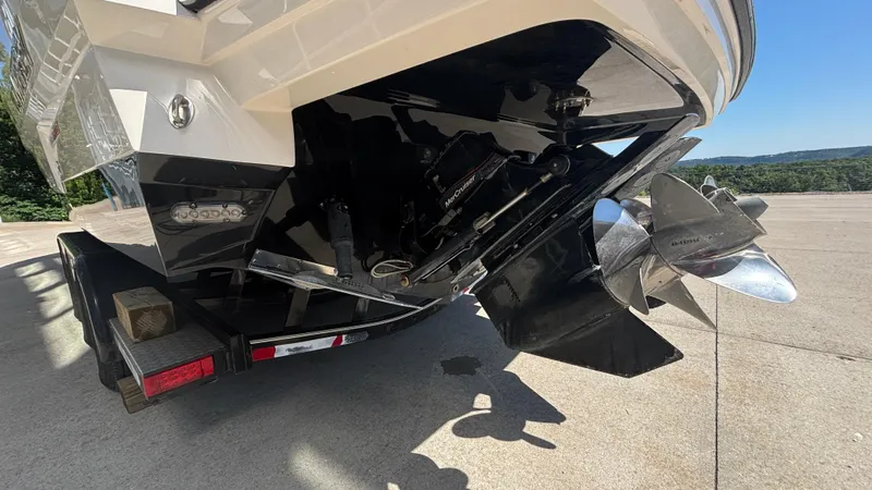  Yacht Photos Pics 2014 Monterey 328 Super Sport boat propeller and stern on trailer.