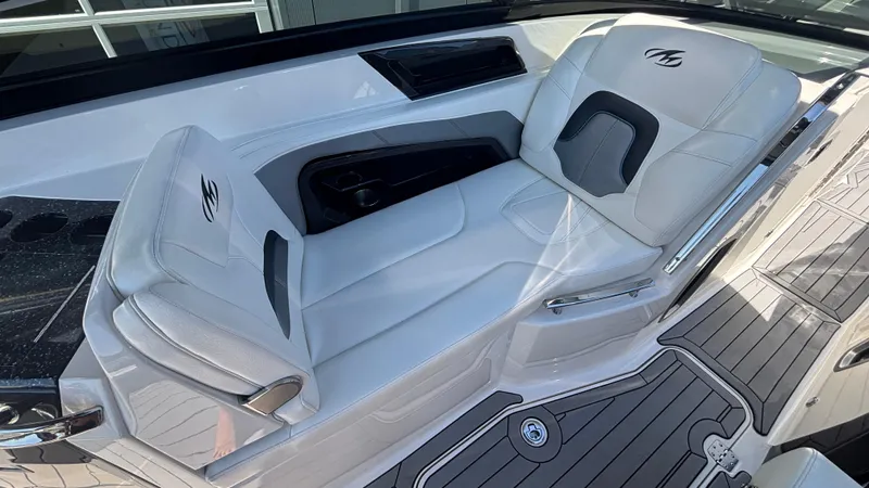  Yacht Photos Pics Luxurious seating on a 2014 Monterey 328 Super Sport boat, featuring sleek white upholstery.