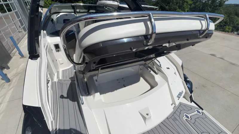  Yacht Photos Pics 2014 Monterey 328 Super Sport boat with sleek design and spacious seating area.