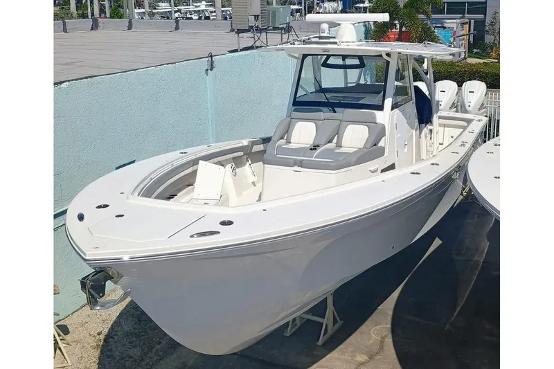 41-083 Yacht Photos Pics 2023 Regulator 41 boat with sleek design, spacious seating, and modern features.