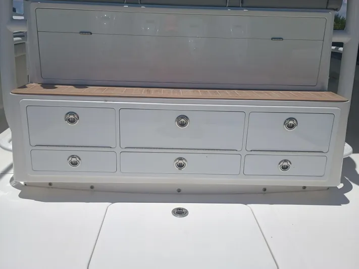 41-083 Yacht Photos Pics 2023 Regulator 41 boat storage drawers with sleek design and stainless steel handles.