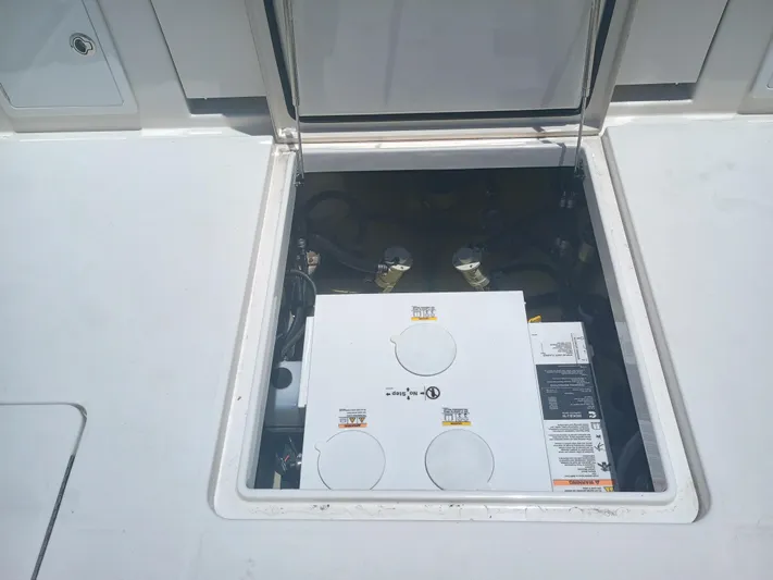 41-083 Yacht Photos Pics Open hatch on 2023 Regulator 41 boat, revealing internal components.