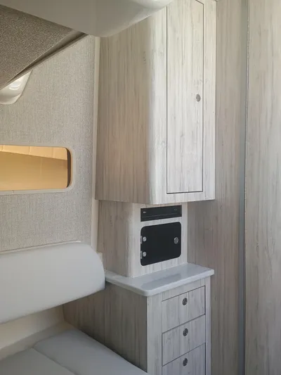 41-083 Yacht Photos Pics 2023 Regulator 41 interior with light wood cabinetry and seating.