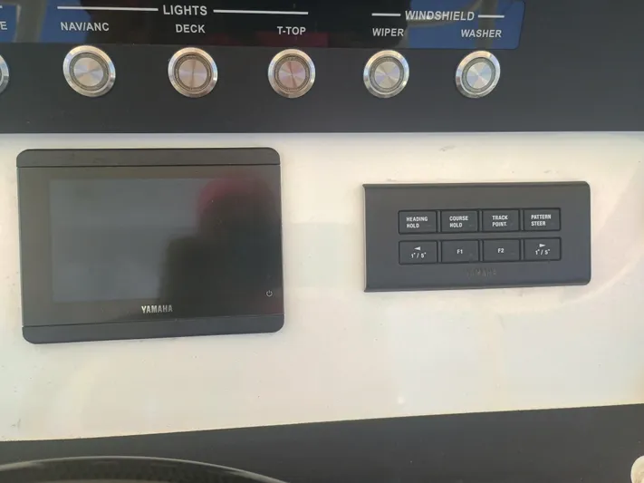 41-083 Yacht Photos Pics Control panel of a 2023 Regulator 41 boat with Yamaha display and buttons.