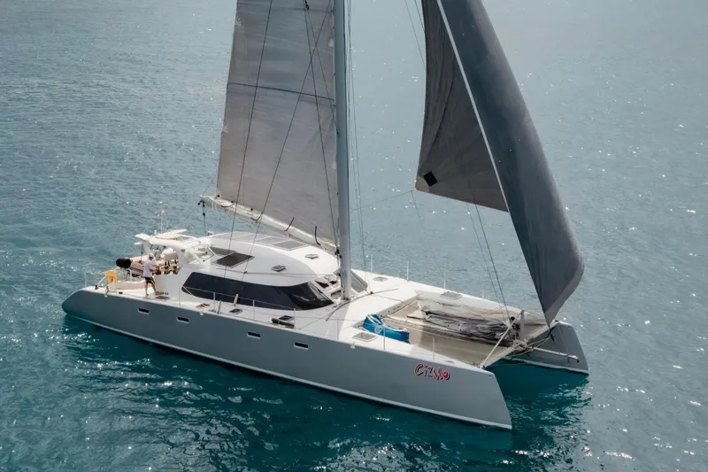 Gizmo Yacht Photos Pics Sailing catamaran Morrelli & Melvin 65 custom, 2012, gliding on clear blue water.