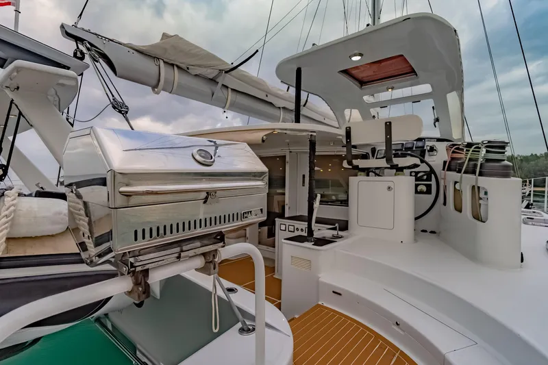 Gizmo Yacht Photos Pics Luxurious 2012 Morrelli & Melvin 65 custom yacht deck with grill and helm.