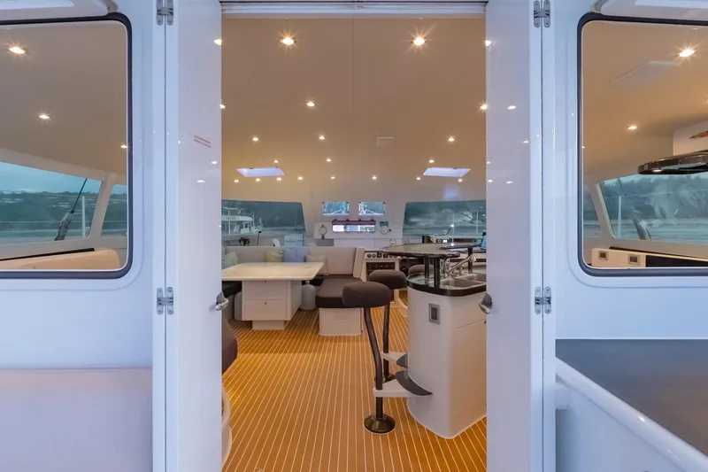 Gizmo Yacht Photos Pics Luxurious interior of 2012 Morrelli & Melvin 65 custom yacht with modern design and seating.