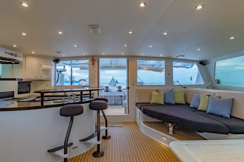 Gizmo Yacht Photos Pics Luxurious interior of 2012 Morrelli & Melvin 65 custom yacht with modern seating and ocean view.