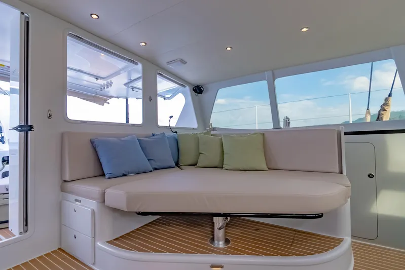 Gizmo Yacht Photos Pics Luxurious interior of 2012 Morrelli & Melvin 65 custom yacht with plush seating and cushions.