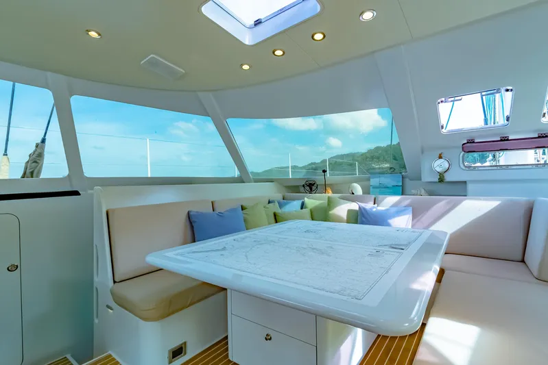 Gizmo Yacht Photos Pics Luxurious interior of 2012 Morrelli & Melvin 65 custom yacht with scenic ocean view.