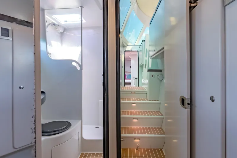 Gizmo Yacht Photos Pics Interior of 2012 Morrelli & Melvin 65 custom yacht, featuring modern bathroom and staircase.