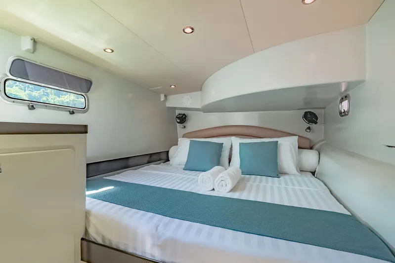 Gizmo Yacht Photos Pics Luxurious cabin interior of 2012 Morrelli & Melvin 65 custom yacht with elegant bedding.