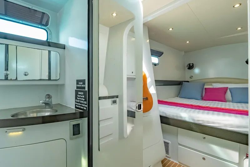 Gizmo Yacht Photos Pics Luxurious Morrelli & Melvin 65 custom yacht interior with modern bathroom and cozy bedroom, 2012 model.