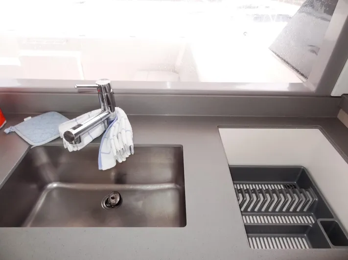 Meow Or Never Yacht Photos Pics Modern kitchen sink and drying rack on Leopard 45 yacht, 2020 model.
