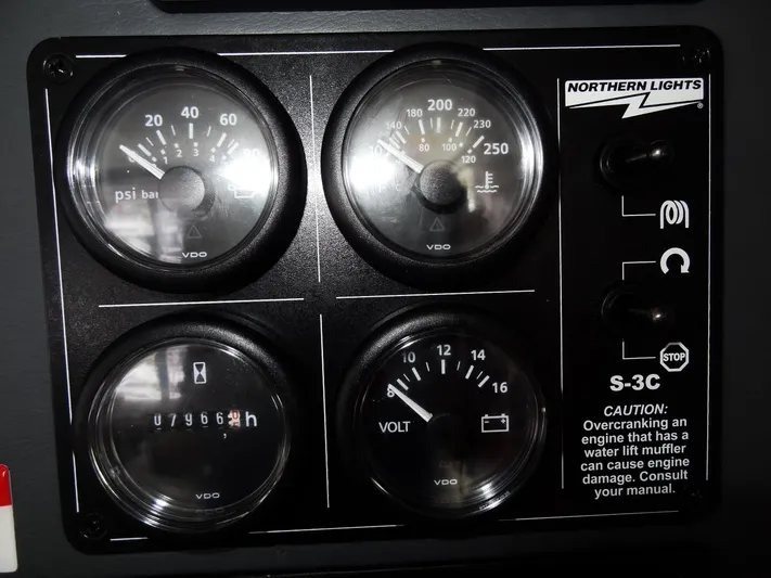 Meow Or Never Yacht Photos Pics Control panel with gauges and caution label on a 2020 Leopard 45.