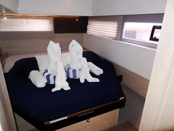 Meow Or Never Yacht Photos Pics Leopard 45 yacht bedroom with towel art on bed, 2020 model.