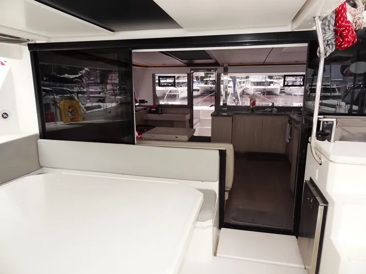 Meow Or Never Yacht Photos Pics Interior of 2020 Leopard 45 catamaran, featuring modern seating and spacious layout.