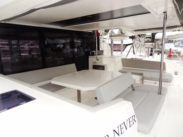 Meow Or Never Yacht Photos Pics Spacious outdoor seating on 2020 Leopard 45 catamaran with modern design.
