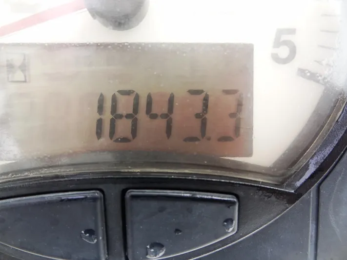 Meow Or Never Yacht Photos Pics Close-up of Leopard 45 dashboard displaying 1843.3 hours.