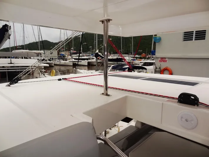 Meow Or Never Yacht Photos Pics Leopard 45 catamaran docked at marina, showcasing deck and rigging, 2020 model.