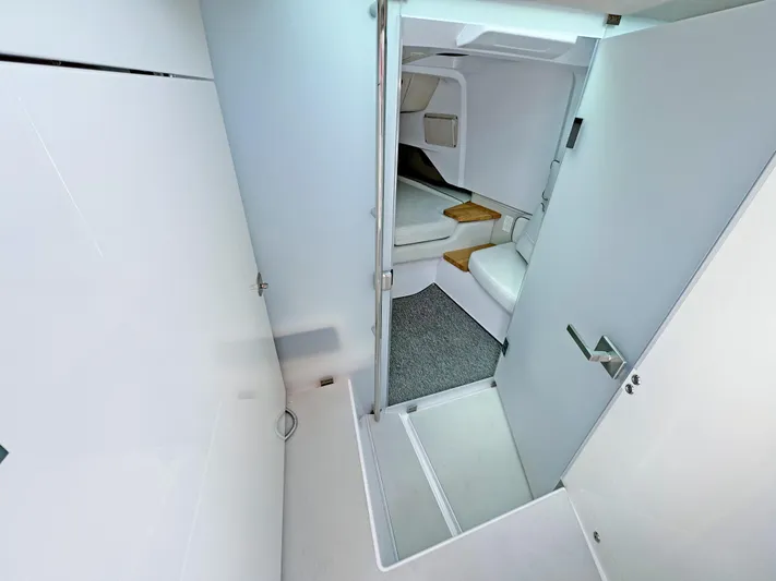  Yacht Photos Pics 2025 Axopar 37 Sun Top interior cabin with modern design and compact layout.