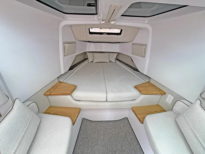  Yacht Photos Pics 2025 Axopar 37 Sun Top cabin interior with modern design and comfortable seating.