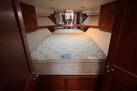  Yacht Photos Pics Interior cabin of 1993 Viking 45 Convertible yacht with double bed.