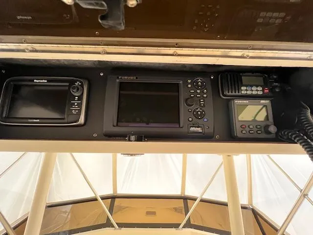 Yacht Photos Pics 1993 Viking 45 Convertible boat dashboard with navigation and communication equipment.