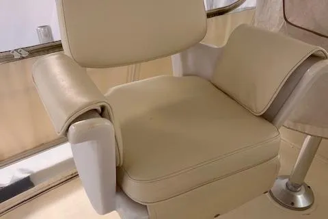  Yacht Photos Pics Beige captain's chair on 1993 Viking 45 Convertible yacht.