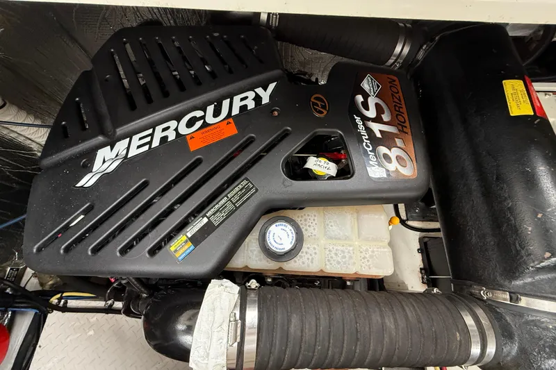 Houligan's Haven Yacht Photos Pics Mercury MerCruiser 8.1S Horizon engine in 2004 Cruisers 370 Express boat.