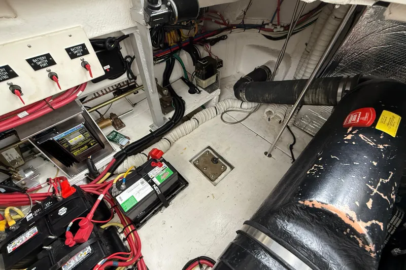 Houligan's Haven Yacht Photos Pics Engine room of 2004 Cruisers 370 Express with batteries and wiring.