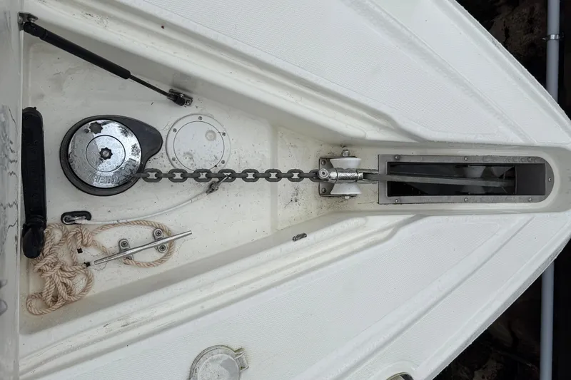 Houligan's Haven Yacht Photos Pics 2004 Cruisers 370 Express boat anchor chain and winch system on deck.