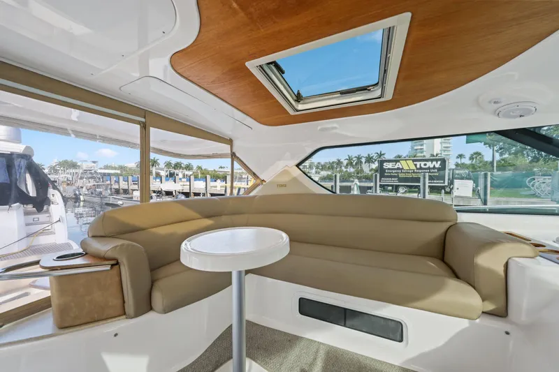  Yacht Photos Pics Interior of 2008 Tiara Yachts 4300 Sovran with beige seating and marina view.