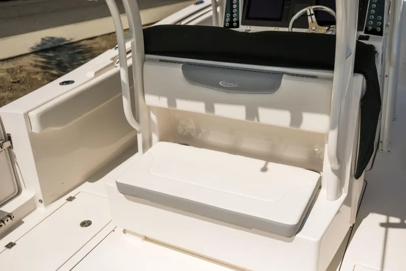 Elixir Yacht Photos Pics 2023 Robalo R302 Center Console boat interior with seating and console details.