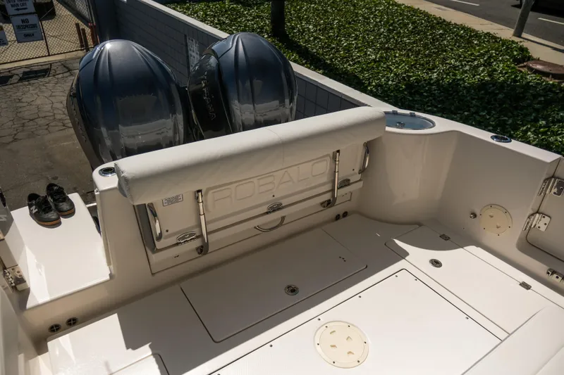 Elixir Yacht Photos Pics 2023 Robalo R302 Center Console boat with dual engines, spacious deck, and sleek design.