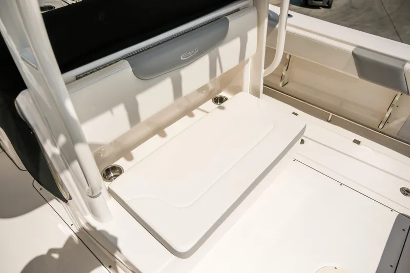 Elixir Yacht Photos Pics 2023 Robalo R302 Center Console boat interior with seating and storage features.