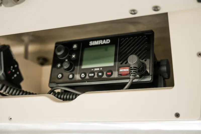 Elixir Yacht Photos Pics Simrad marine radio on 2023 Robalo R302 Center Console boat.