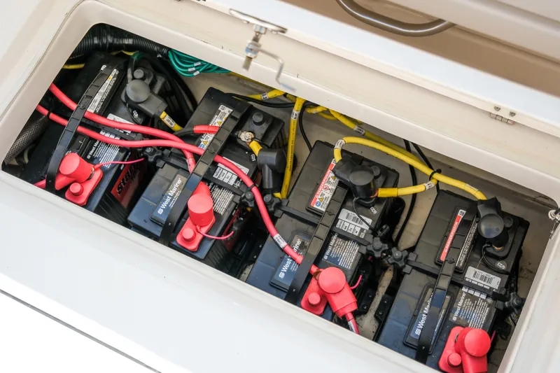 Elixir Yacht Photos Pics Battery compartment of 2023 Robalo R302 Center Console with multiple connected batteries.