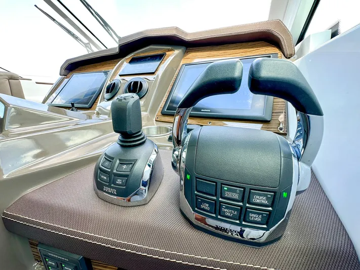  Yacht Photos Pics Helm controls of 2016 Cruisers Yachts Cantius 45 with advanced navigation systems.