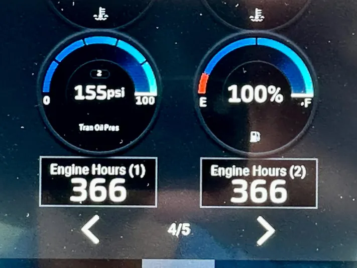  Yacht Photos Pics Dashboard display of 2016 Cruisers Yachts Cantius 45 showing engine hours and oil pressure.