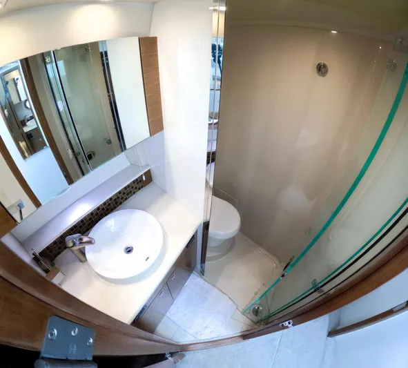  Yacht Photos Pics Bathroom interior of 2016 Cruisers Yachts Cantius 45, featuring modern sink and shower.