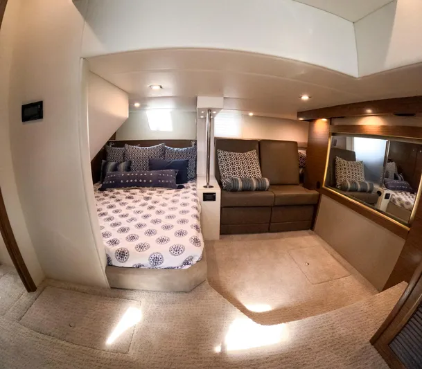  Yacht Photos Pics Interior of 2016 Cruisers Yachts Cantius 45, featuring a cozy bedroom and seating area.