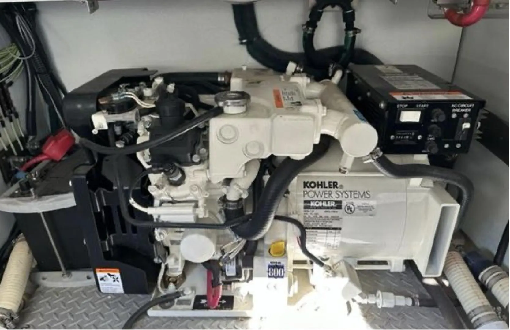 2003 Formula 37 PC engine room featuring a Kohler power system generator.