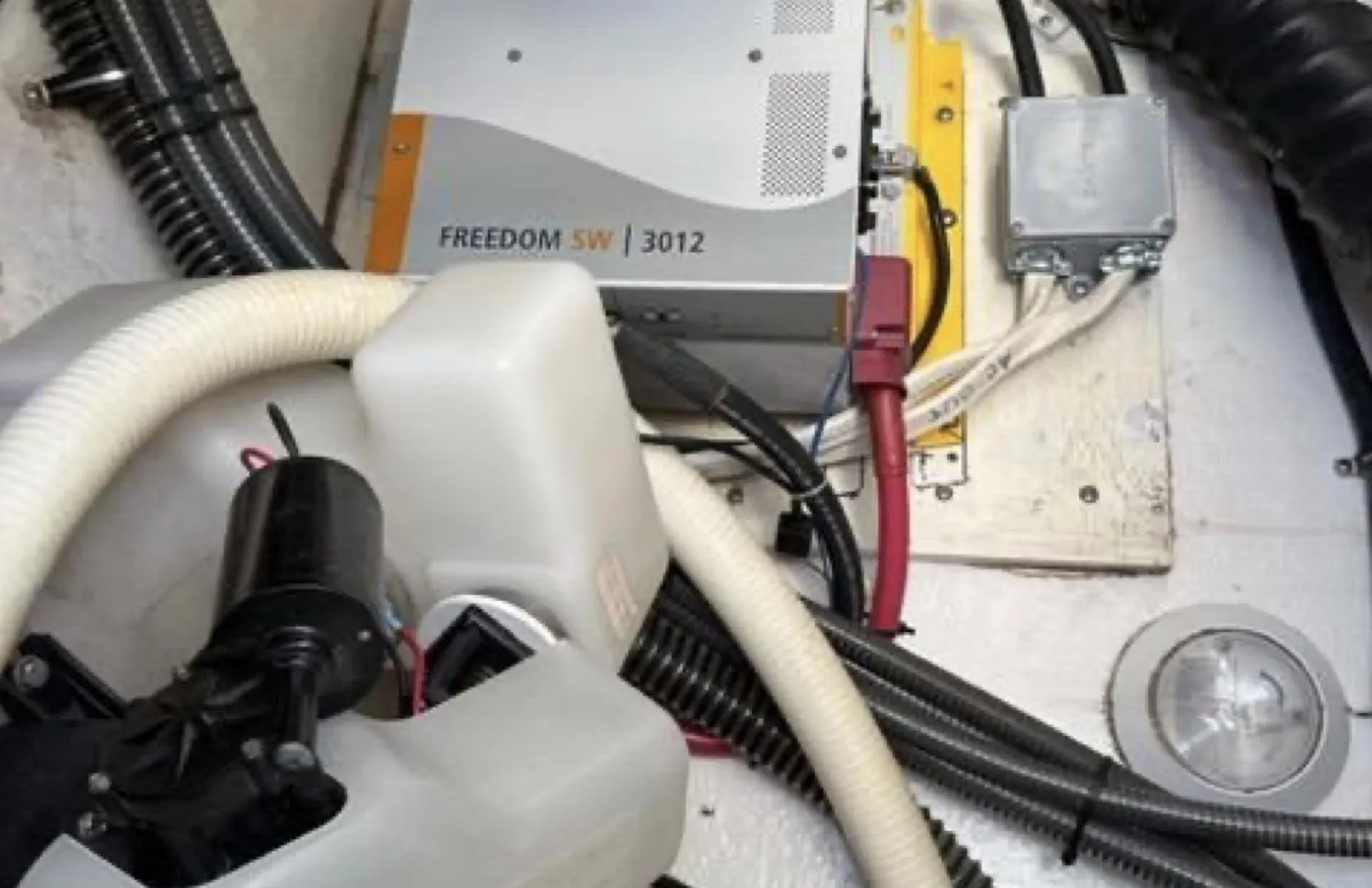 Engine compartment of a 2003 Formula 37 PC boat with Freedom SW 3012 inverter.