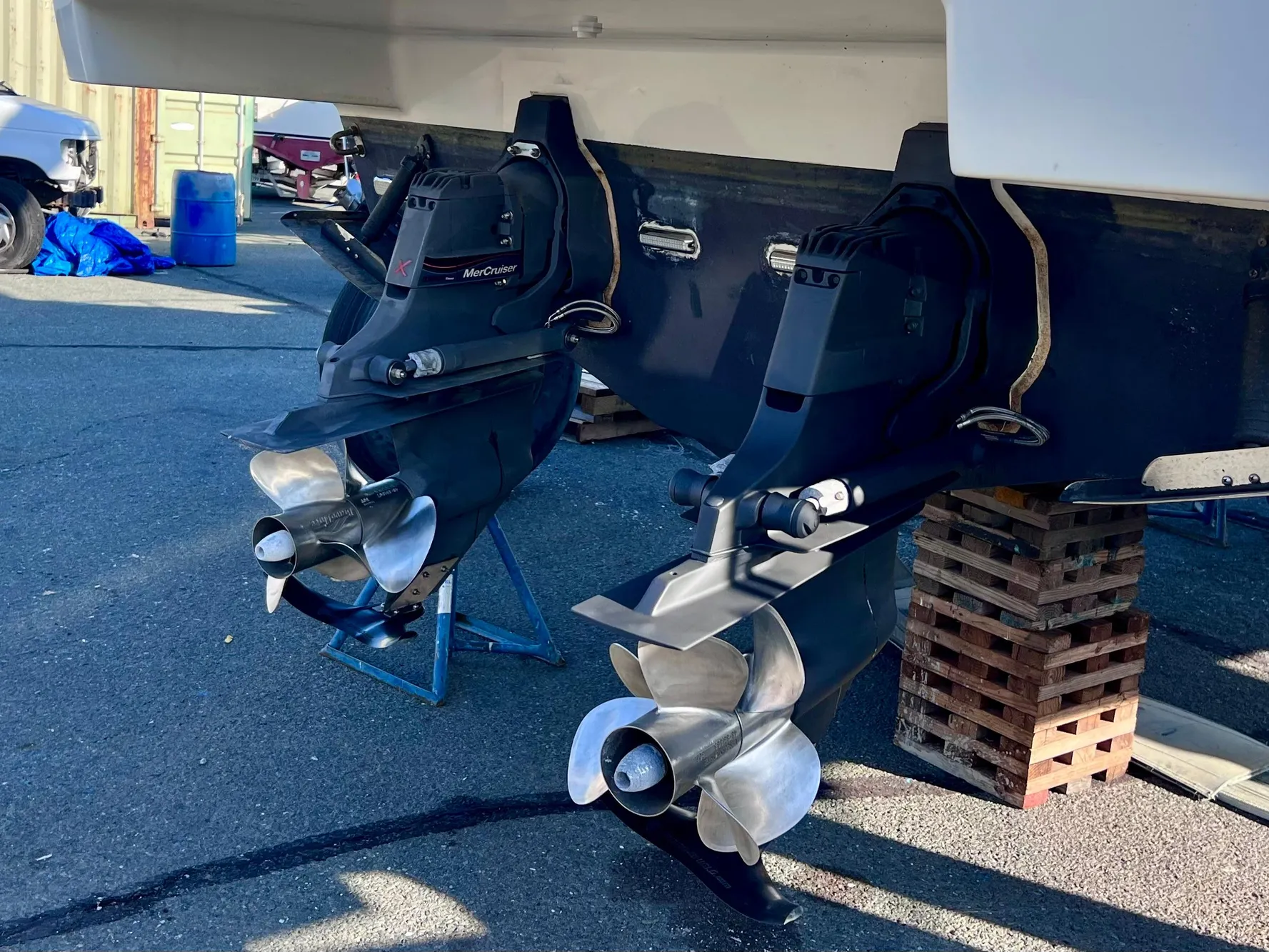 2003 Formula 37 PC boat with dual propellers on dry dock.