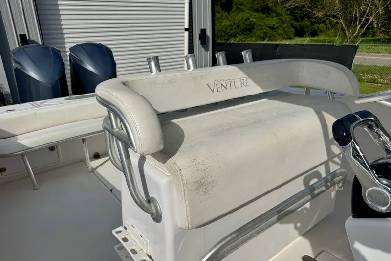  Yacht Photos Pics 2010 Venture 34 Tournament boat interior with seating and controls.